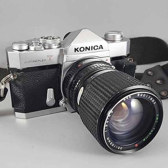 Konica Autoreflex T 35mm SLR Camera w/Tokina 35-150 f/3.5-4.3 + Strap, Manual - Picture 1 of 9